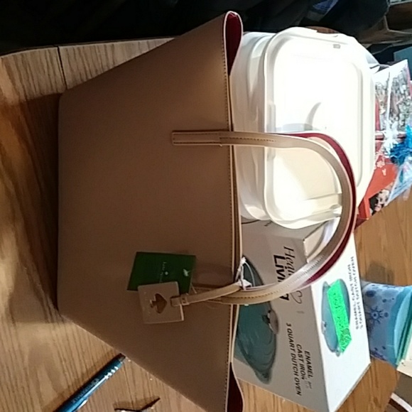 Beige in color Kate Spade zippered purse - Picture 2 of 5